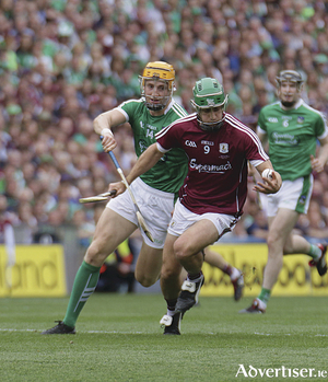 Galway&#039;s David Burke and Limerick&#039;s S&eacute;amus Flanagan in action from the GAA Hurling All  Ireland Senior Championship final in Croke Park, Sunday. Photo:-Mike Shaughnessy
