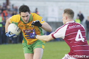 Corofin&#039;s Mike Farragher - a candidate to  man the engine room this weekend, and Annaghdown&#039;s Joe Kevin in action from the Galway Senior Football Championship clash at Tuam Stadium, Sunday. Photo:-Mike Shaughnessy