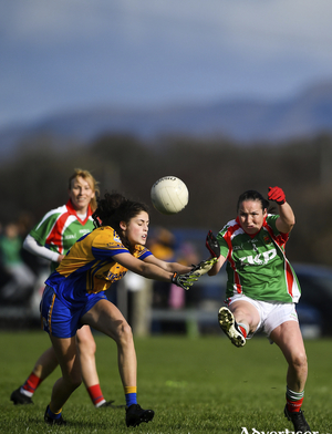 Michelle McGing clears her lines for Carnacon in the county senior final against Knockmore. Photo: Sportsfile
