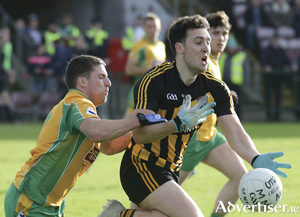 Dylan Wall of Corofin tackles Eoin Finnerty of Mountbellew Moylough in action from the Galway Senior Club Championship Football final at Pearse Stadium on Sunday. Photo:-Mike Shaughnessy