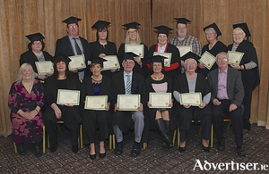 Graduates in the Bachelor of Healing Arts in Kairos therapy from the Connemara College of Natural Healing, standing (l-r): Jacqueline Keane-Lyons, John Joyce, Anne Miller, Ann Roche, Ann Conwell, Francis Fitzgerald, Mairead N&iacute; Chonaola and Mary Forde. Seated (l-r): Maureen Maloney Faherty of the Connemara College of Natural Healing, Pauline N&iacute; Chonchubhair, Christine Kilkenny, Padria &Oacute; Beaghaoich, Patrica Dolan, Theresa Hoban, and Jimmy Faherty of the Connemara College of Natural Healing at the College&rsquo;s graduation ceremony recently. Photo: Mike Shaughnessy.