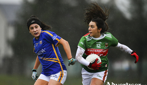 On the run: Niamh Kelly makes a break for Mayo. Photo: Sportsfile 