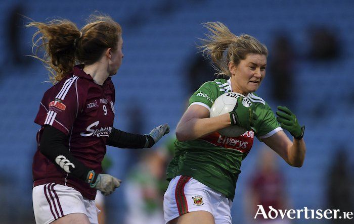 On the run: Grace Kelly looks to make ground for Mayo. Photo: Sportsfile. 
