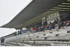 Waiting in the rain: A view of the crowd prior to the postponement of the Allianz Hurling League division 1B match between Waterford and Galway at Walsh Park in Waterford. The game will be replayed on Sunday at 2pm.
					Photo by Seb Daly/Sportsfile