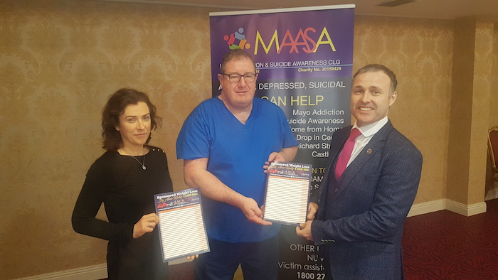 Michelle Corbett with Alan Reilly who is doing a sponsored weight loss for MAASA with Declan Halligan from MAASA. 