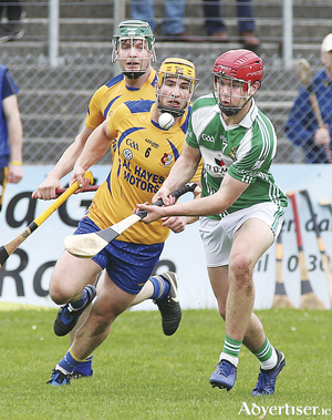 Sean Neary of Castlegar, and Martin Dolphin of Portumna in the Senior A Group 1 Senior Hurling Championship game in Kenny Park, Athenry.
Photograph: Mike Shaughnessy