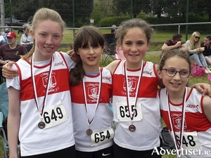 GCH relay athletes,  Tara Keane, Caitlin Podmore, Thea Power, and Eireann Greene.