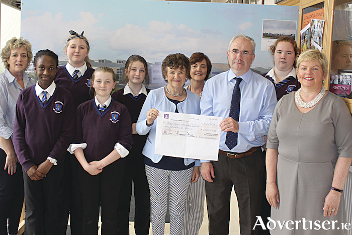 Right: Principal of Clarin College Athenry, Kieran Folan, presents a cheque for €1,000 to Mary Booth for her upcoming trip to Malawi on behalf of students and staff in the school.
Maude Mahony, Danielle Ogunbayo, Emma Murphy, Alisha Frawley,
Lily Claffey Howard, Mary Booth, Patricia Loughnane, Ciaran  Folan 
and Noreen Qualter.