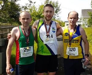 The first three men home in the Ballyhaunis 10 mile race: Pat Morrison (3rd), Michael Canty (1st), Adrian Smith (2nd)