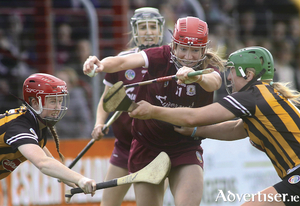 Galway&#039;s Caitriona Cormican bursts through Kilkenny&#039;s Kellyanne Doyle and Edwina Keane during the Liberty Insurance All-Ireland Senior Championship game in Kenny Park, Athenry on Saturday. Photo:-Mike Shaughnessy.
