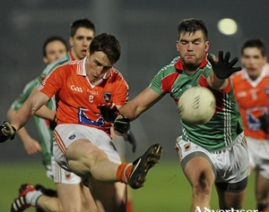 Aidan O&#039;Shea looks to block down Charlie Vernon&#039;s shot during Mayo&#039;s clash with Armagh in the National Football League back in 2012. Photo: Sportsfile  