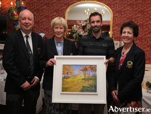 The winner of the Ballinrobe Golf Club&#039;s Presidents prize was Kevin Staunton he is pictured receiving a John Dinan oil painting from club president Mary Day. Also pictured are club captain Tony O&#039;Toole and lady captain Eileen Conlisk. Photo: Trish Forde. 