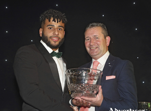 Jordan Loftus, Castlebar Celtic is presented with the  &quot;Footballer of the Year 2019&quot; by Gerry Tully Administrator Connacht FA at the Mayo Football League Annual Presentation Dinner and Awards Night in the Castlecourt Hotel Westport. Photo: Michael Donnelly