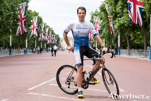 Mark Beaumont on the road to Buckingham Palace.