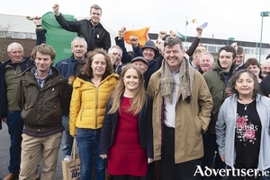 Mair&eacute;ad Farrell with her team celebrate after she was elected a TD to D&aacute;il Eireann on Monday. Pictured below, Mairead and her family get ready to celebrate her win. Photos by Mike Shaughnessy