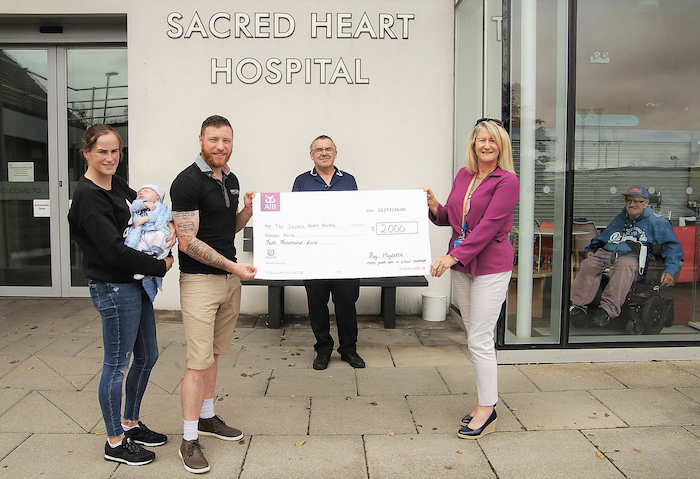 Carole King (Director of Nursing) and Tim Nicholas (Clinical Nurse Manager) at the  Sacred Heart Hospital in Castlebar,  being presented with a cheque for E2,000 by Ray Moylette his wife Sharon and son Colby-Ray - also in photo is Sacred Heat Hospital resident JoJo Gannon. Photo: John Moylette. 
