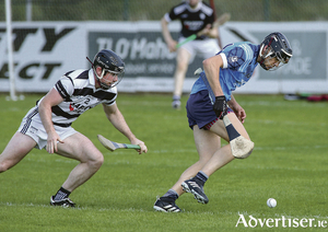 Padraic Keane of  Oranmore Maree, and Mikey Morris, Turloughmore, in the Senior A Group 2 hurling championship game at Kenny Park, Athenry.
