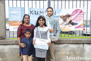 Abigail Sunil, maths gold medallist and recipient of the Stephen Hayden Trophy, with her family after the Kumon 2020 Awards ceremony. Photo: Murtography.