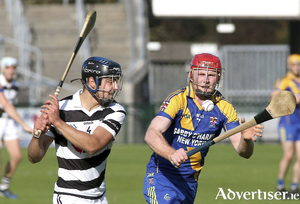 Turloughmore&rsquo;s Daniel Loftus and Loughrea&rsquo;s Sean Sweeney in action during the Senior Hurling Championship semi -final at Pearse Stadium. Photograph: Mike Shaughnessy