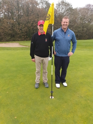 Second shots: Eugene Lavelle and Ronan Heir pictured after they both holed their second shots on the 13th hole at Westport Golf Club last Sunday. 