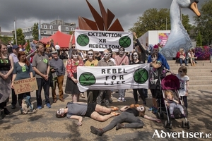 Members of Extinction Rebellion Galway at the &#039;die-in&#039; protest which took place on Saturday July 27 2019 at Eyre Square.