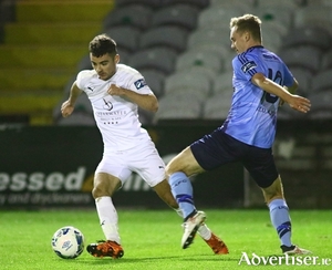 Galway United&#039;s goal scorer Stephen Christopher rounds UCD&#039;s Mark Dignam in action from the SSE Airtricity game at Eamonn Deacy Park on Tuesday night.  Photo:-Mike Shaughnessy