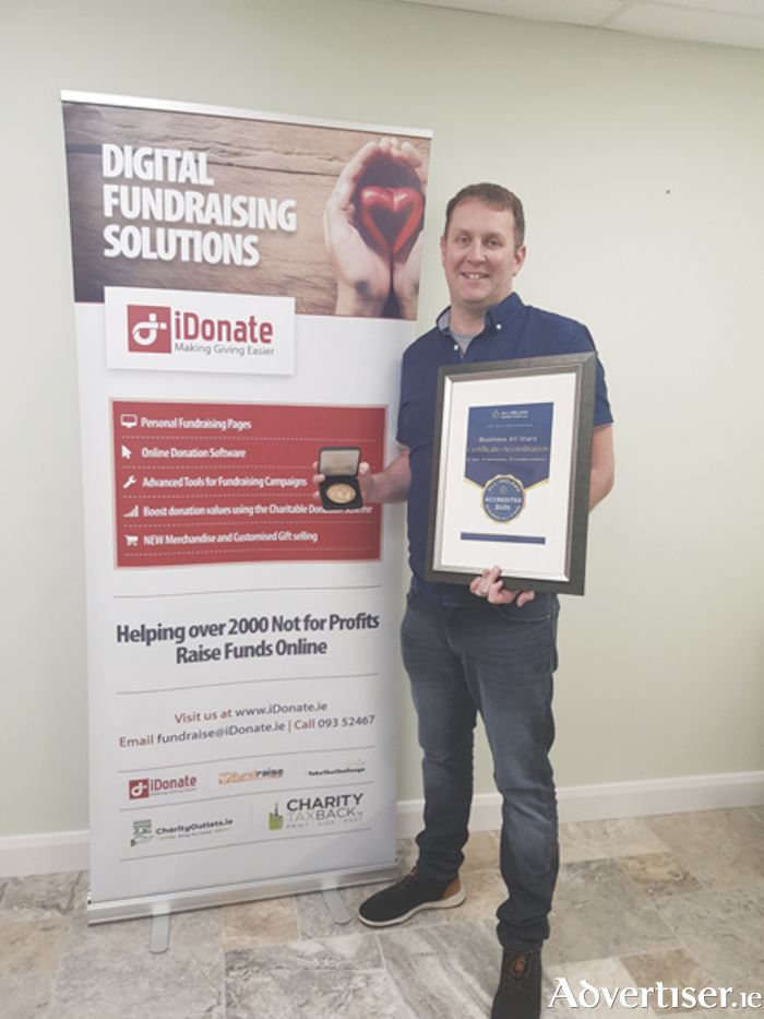 Donate Co-founder Alan Coyne is pictured with the recently attained Guaranteed Irish accreditation.
