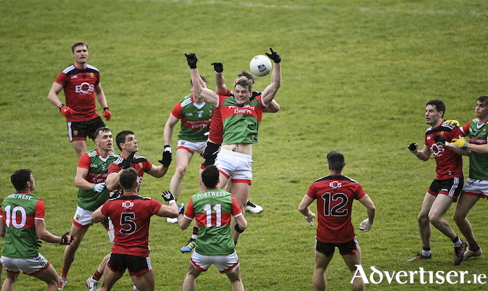 Up in the air: Matthew Ruane rises to try and win the ball. Photo: Sportsfile 
