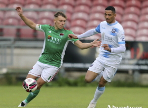 Mikey Place, Galway United, and Beineon O&#039;Brien-Whitmarsh, Cork City, in action at Turners Cross.