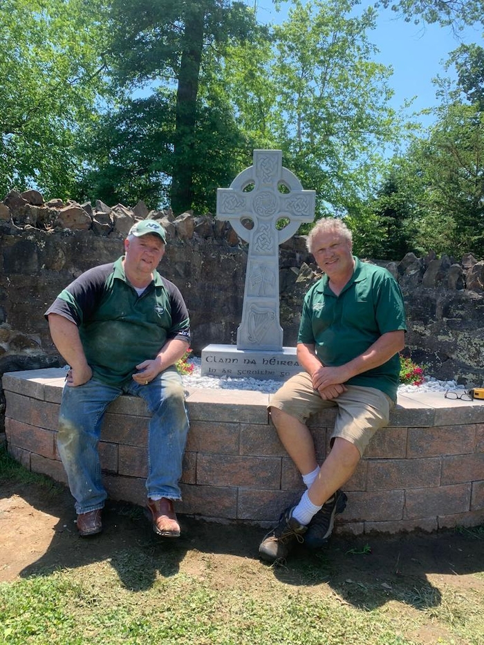 The cross in place in New Jersey and the event co-chairs, Karl Burke and Oliver Browne. 