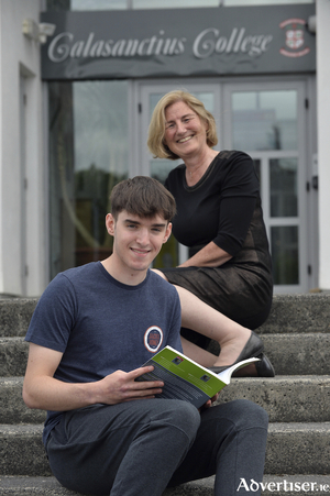 
Leaving Cert student Evan Grealish, who came second in Irish Mathematical Olympiad  2021, pictured with principal Cora Ni Loinsigh after the maths exam at Calasanctius College, Oranmore, Galway. Photo: Ray Ryan.