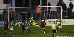Cork City goalkeeper Mark McNulty saving a late free kick from Galway United&#039;s Mikie Rowe at Eamonn Deacy Park on Friday.