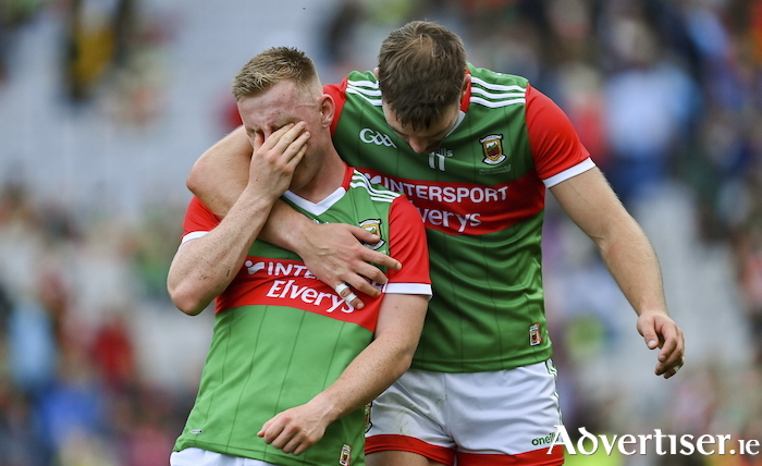 Brothers in arms: Ryan O'Donoghue of Mayo is consoled by team-mate Aidan O'Shea after the GAA Football All-Ireland Senior Championship Final match between Mayo and Tyrone at Croke Park in Dublin. Photo: Brendan Moran/Sportsfile