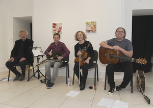 Striking a tune at Culture Night at the Custom House Studios gallery Poet Ger Reidy with musicians Diarmuid, Deirdre and Donnacha Moynihan. Photo: Conor McKeown