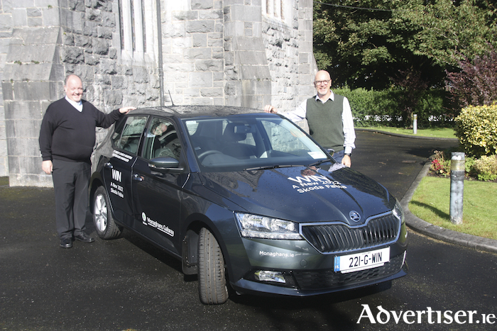 Pictured are Fr Ray Flaherty, parish priest and Eamon Walsh, chairperson of the Parish Pastoral Council, with the top prize in the Headford Church Restoration fundraising, a brand new 2022 reg Skoda Fabia car. (Car pictured is a sample of the model and for demonstration purposes)