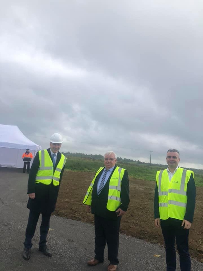 Taoiseach Micheál Martin, Cllr John Caulfield and Deputy Dara Calleary at the sod turning of the new road project this week. 