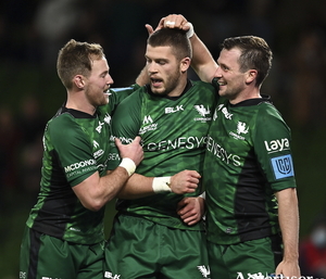 Try-scorer Diarmuid Kilgallen celebrates with Kieran Marmion  and Jack Carty during the United Rugby Championship match against Ulster at Aviva Stadium in Dublin. Photo:  Brendan Moran/Sportsfile