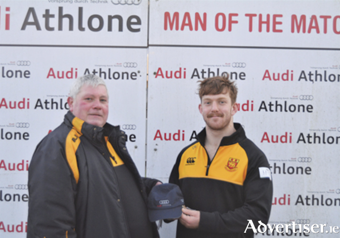 Ciaran Booth is presented with the AUDI ATHLONE ‘Man of the Match’ award from Martin Webster of Buccaneers after the weekend win over Rainey Old Boys