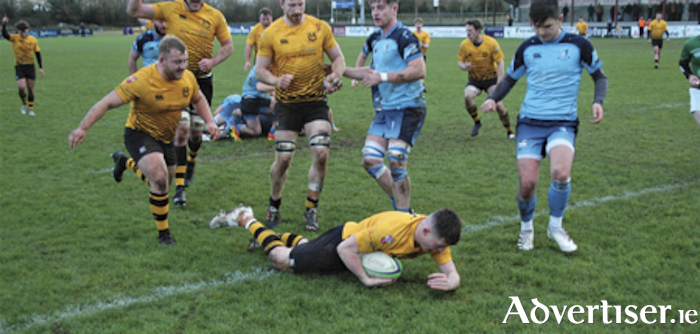 Darren Browne glides across the line to score Buccaneers try against MU Barnhall in Dubarry Park 