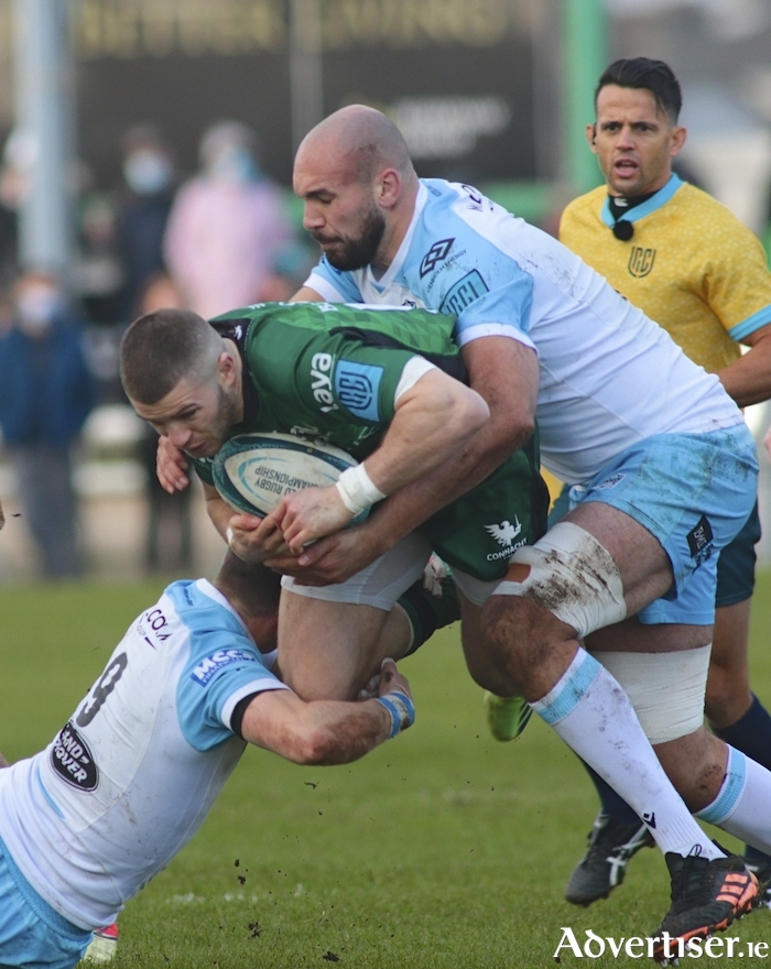 Connacht's Diarmuid Kilgallen is tackled by Glasgow Warriors George Horne and Kiran McDonald in the URC game against Glasgow at the Sportsground on Saturday. Photo:- Mike Shaughnessy