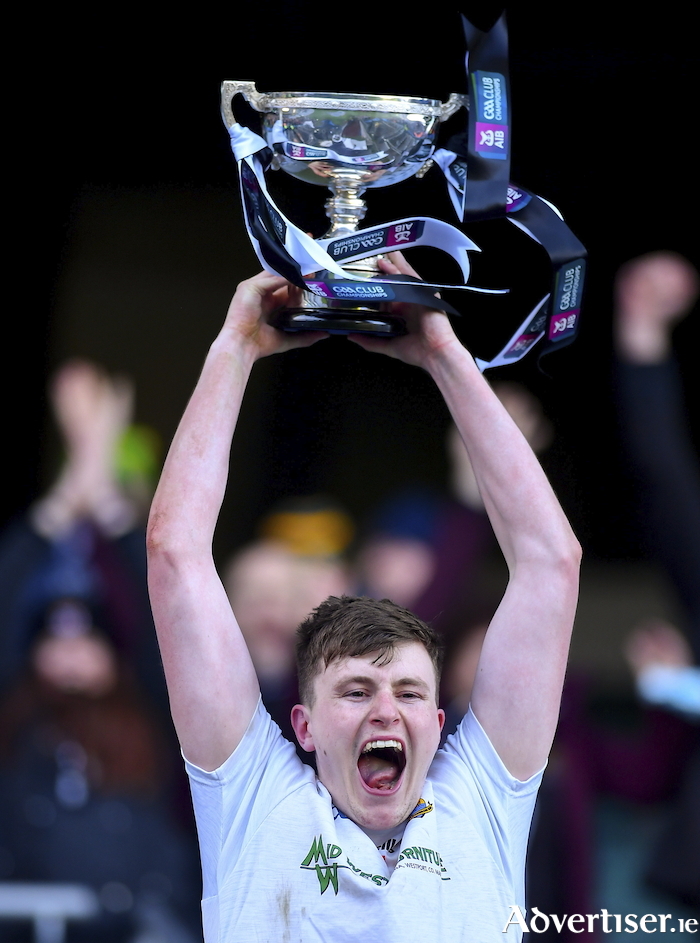 That winning feeling: Kilmeena captain Sean Ryder lifts the trophy after his sides win in the All Ireland Junior Football Club Championship final. Photo: Sportsfile 