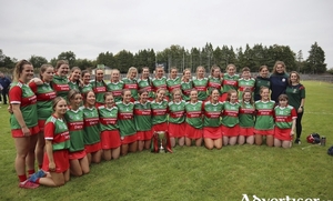 Champion smiles: The Mayo camogie squad celebrate with the Nancy Murray Cup after their win over Tyrone in the final last year. Photo: Mayo Camogie. 