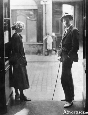  The famous photograph of Joyce with Sylvia Beach at the door of her bookshop Shakespeare and Company, at its original address 12 Rue de L&rsquo;Od&eacute;on (State University of New York, Buffalo).   