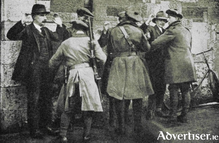 Called the Black and Tans because their uniforms were a mixture of dark green and British army khaki, they gained a reputation for  brutality, and became notorious for reprisal attacks on civilians and civilian property, including  extrajudicial killings, arson and looting. Their actions further swayed Irish public opinion against British rule and drew condemnation in Britain. Pictured here was a typical scene in Ireland’s streets in 1921. 