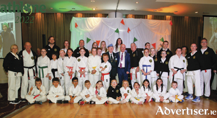 Cathaoirleach of Westmeath County Council, Cllr Frankie Keena, is pictured with representatives from the Athlone Karate Club who claimed first prize for their entry in the St Patrick’s Day parade during the Croi na hEireann Festival