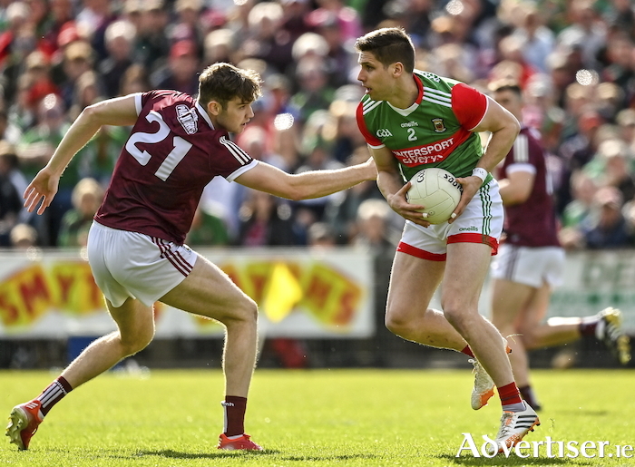 Heading for the backdoor: Lee Keegan looks to get past Patrick Kelly last Sunday in Castlebar. Photo: Sportsfile 