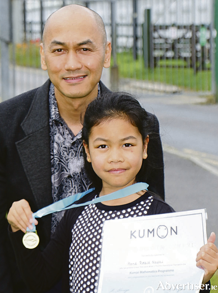 Rosie Nasri with her father Zamran at the Kumon Awards ceremony on Sunday. 
Photo: Mike Shaughnessy.