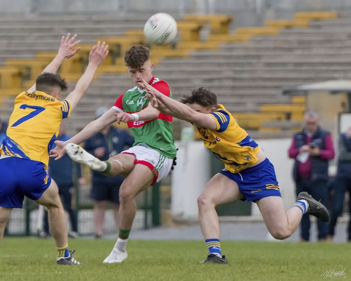 Up and over: Ronan Clarke takes aim for Mayo against Roscommon. Photo: Mayo GAA. 