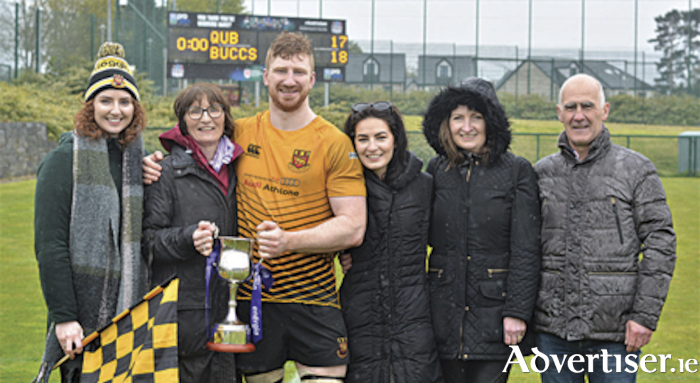 Buccaneers captain Evan Galvin pictured with Dearbla Galvin, his mother, Bernie Galvin, Evanne Breslin, Jacinta Breslin and Ted Breslin following the recent play-off success over Queen’s University