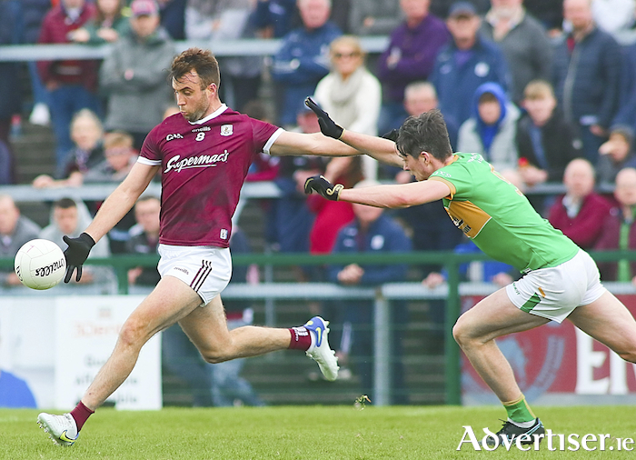 Leitrim's Pearce Dolan attempts to stop Galway's Paul Conroy in action in the Connacht GAA Senior Football Championship semi-final at Pearse Stadium on Sunday. 
Photo:- Mike Shaughnessy